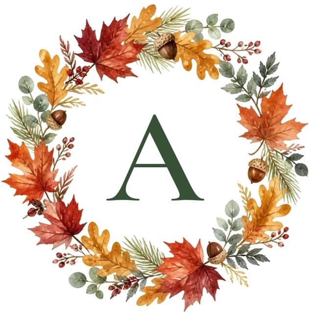 A monogram in a wreath of autumn leaves and acorns